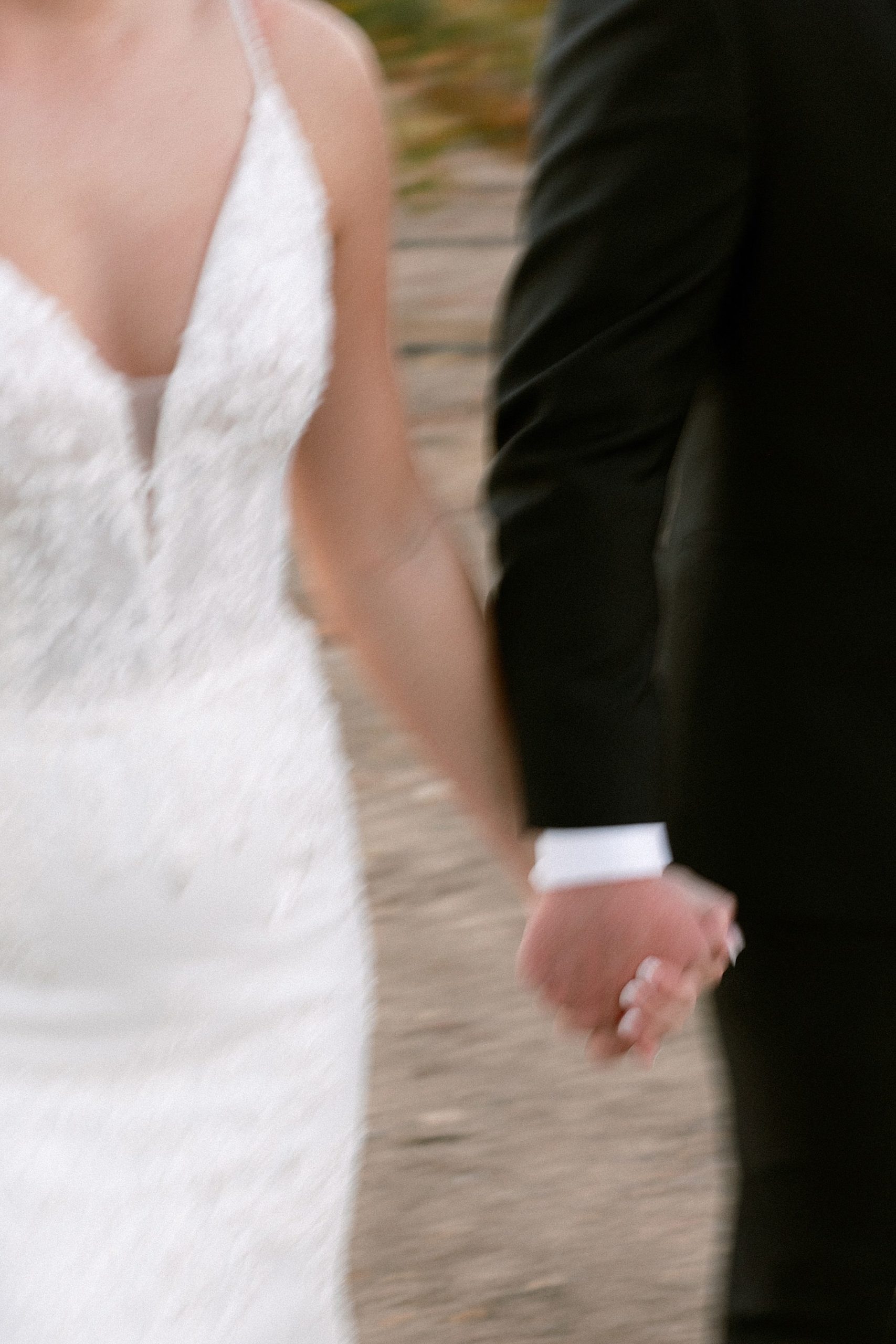 bride and groom holding hands at their Paso Robles wedding