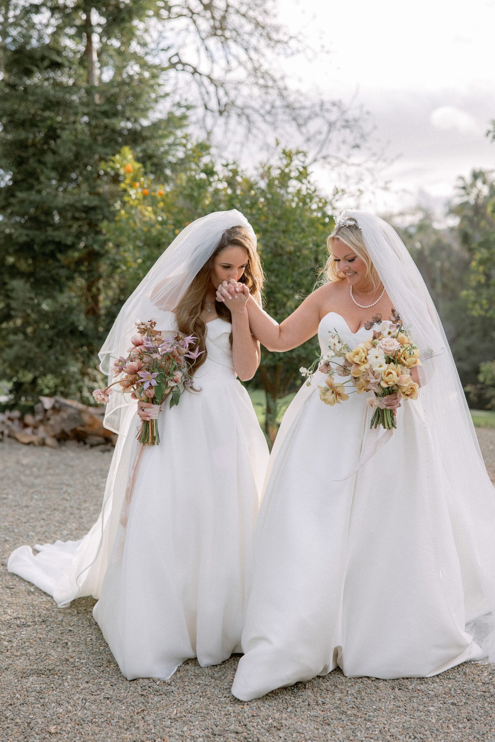 Same sex wedding ceremony with two brides at The Farmhouse at Ojai Valley Inn