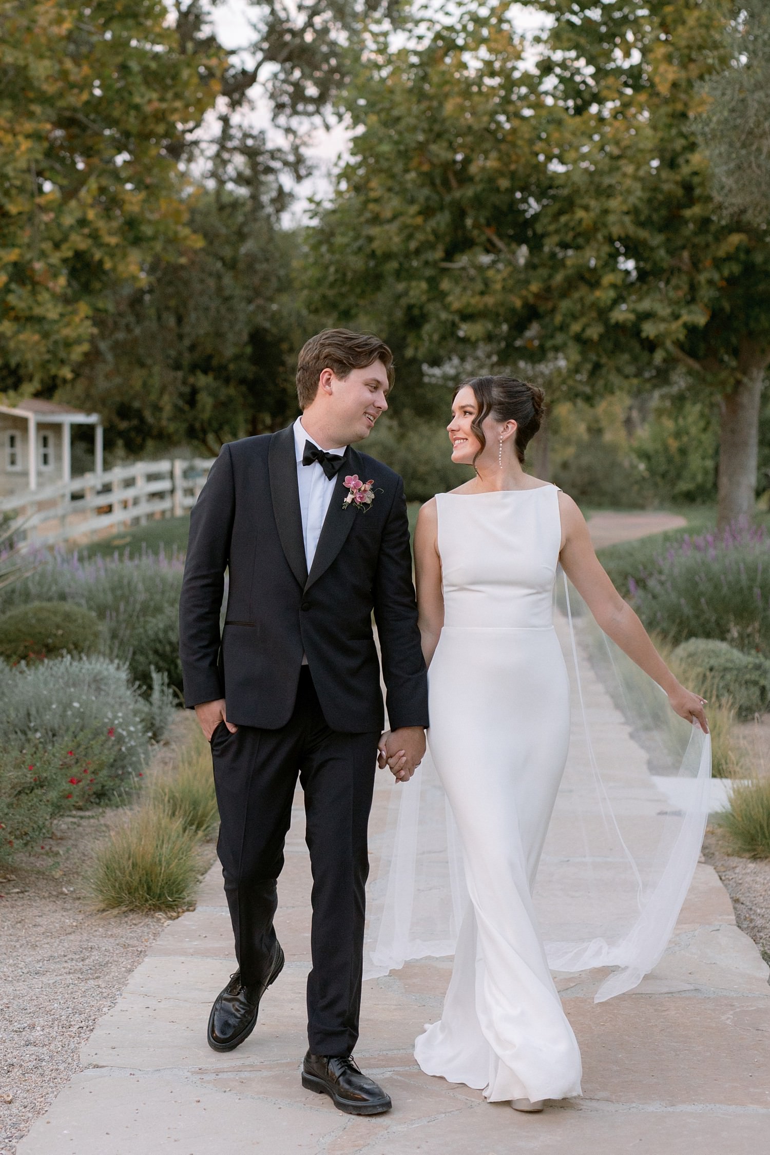 Santa Ynez Ranch wedding bride and groom walking toward the camera