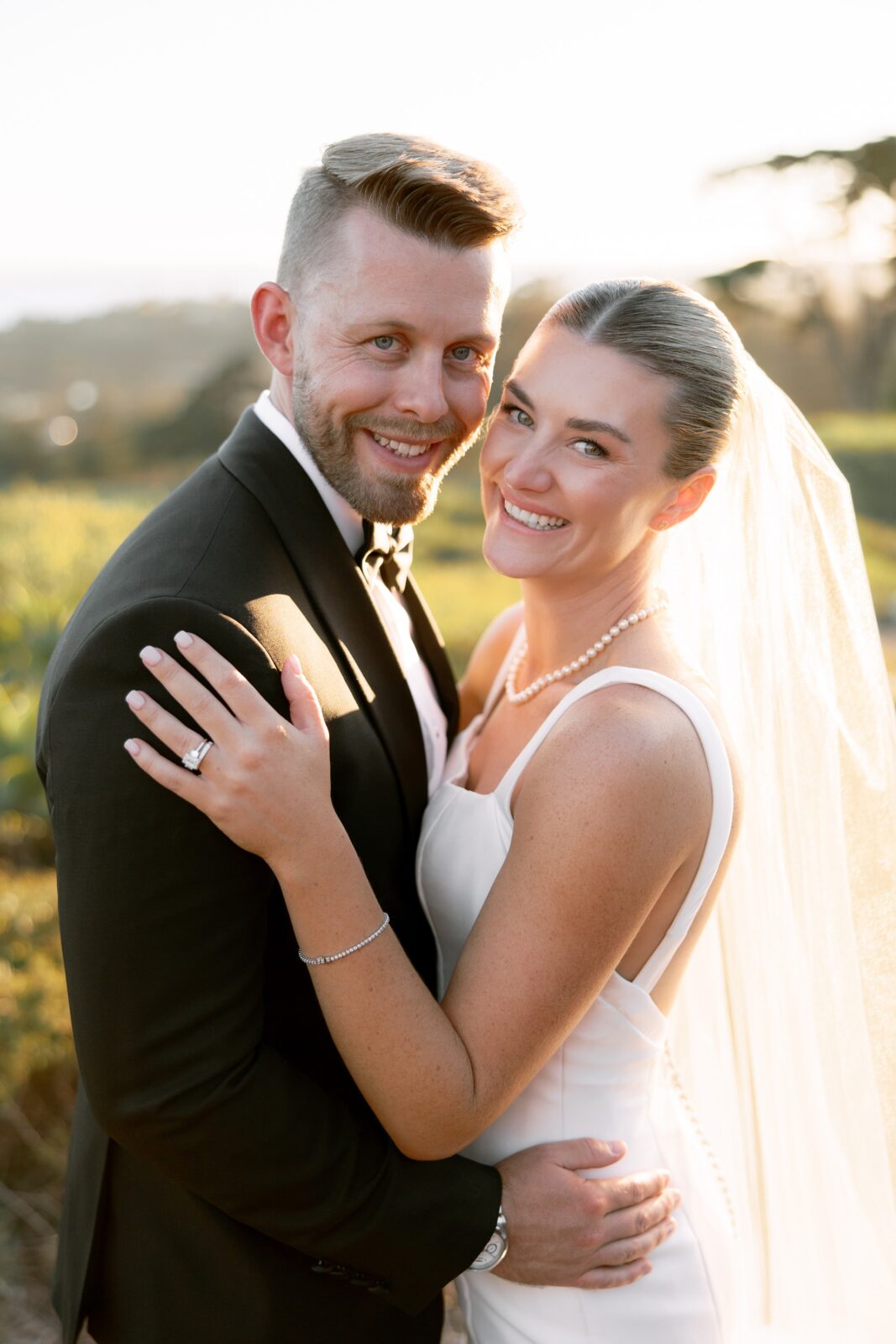 Smiling bride and groom photo