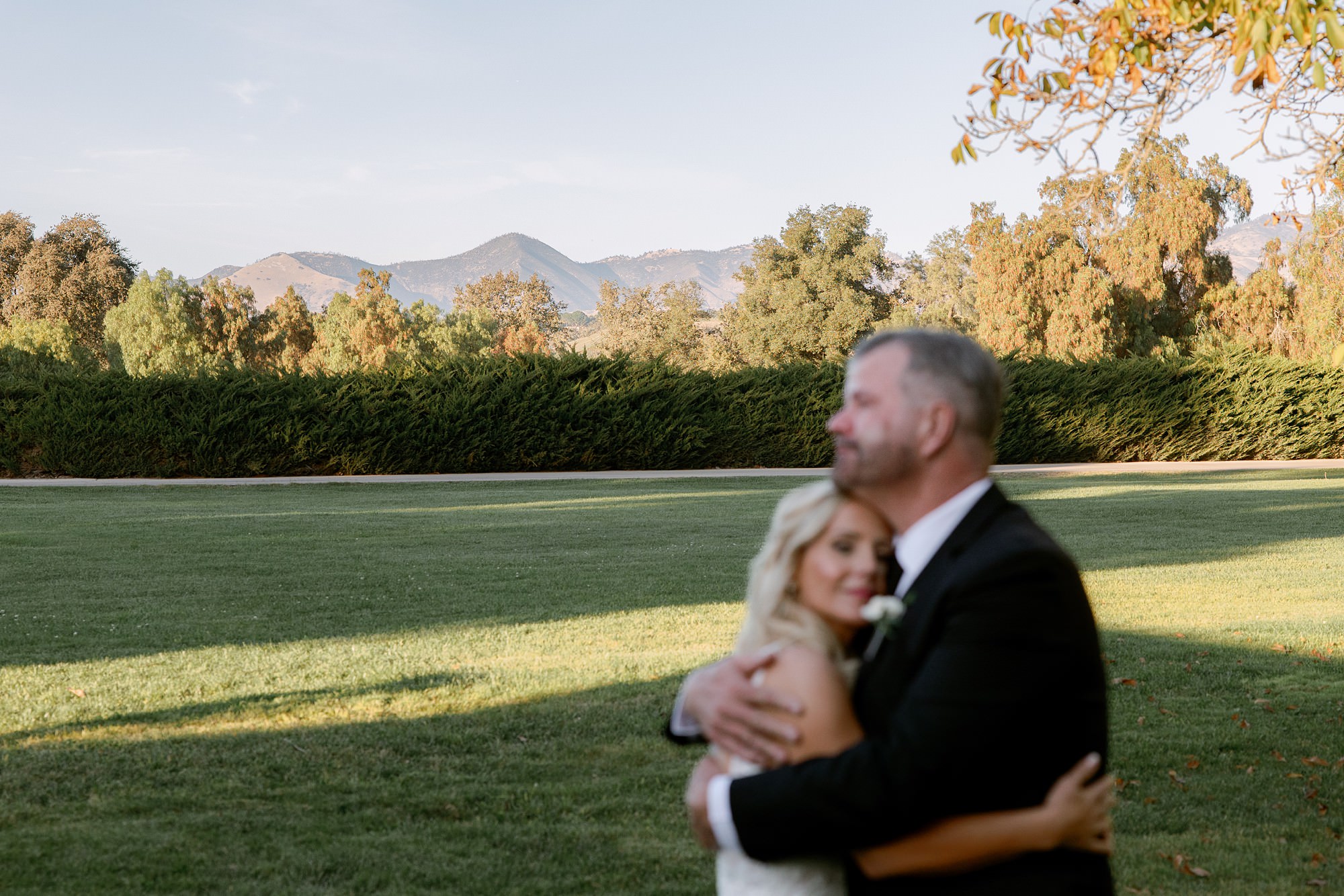 Santa Ynez mountain view with bride and groom