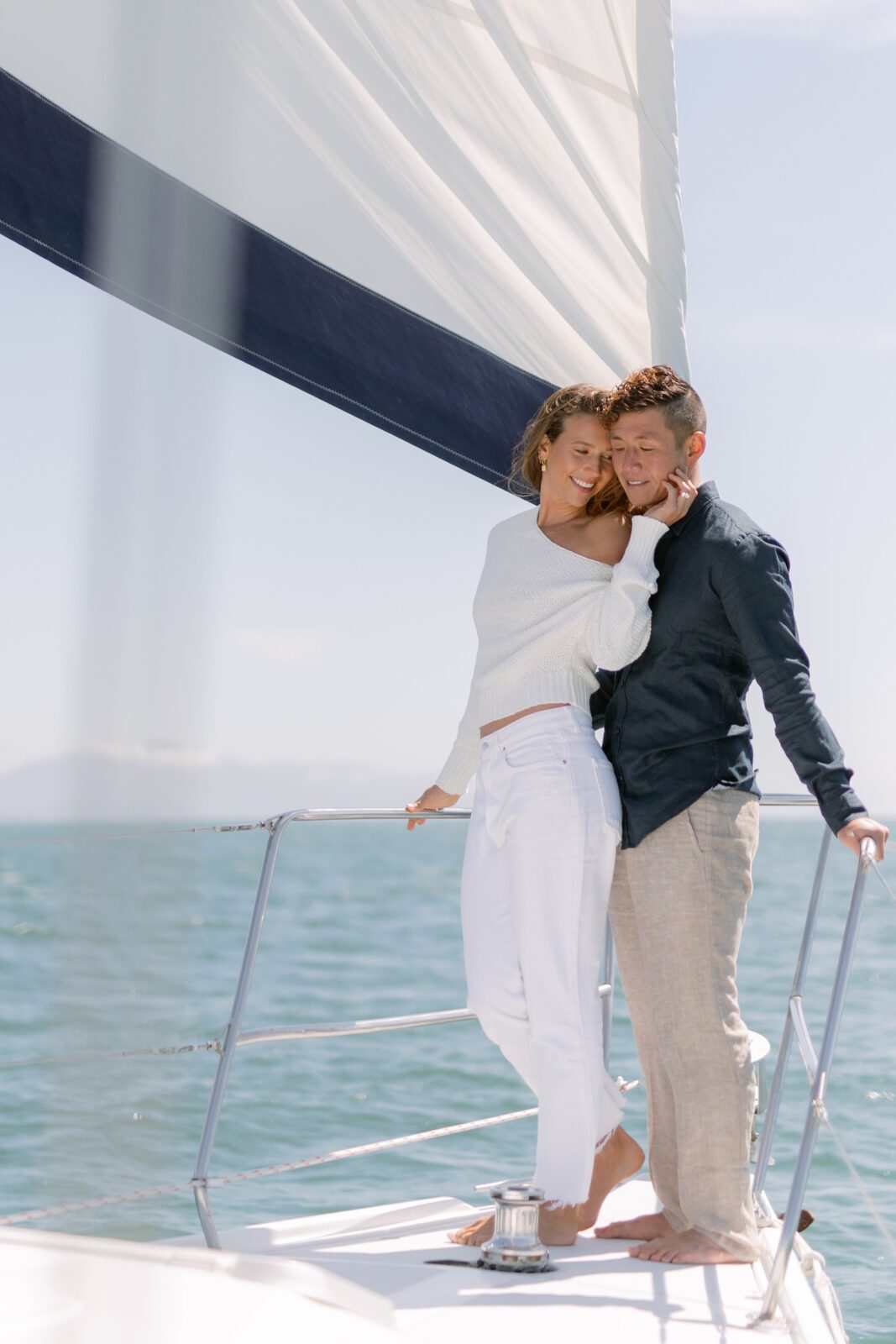 Engaged couple's Sailboat engagement photos